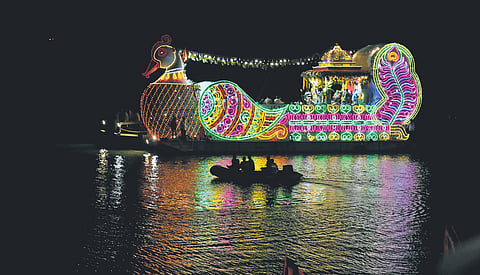 The Teppotsavam ritual marking the conclusion of Dasara festivities was performed at Durga Ghat in Krishna River on Tuesday, Oct 20, 2026. 