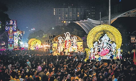 Maa Durga idols assemble at Rupali Square before being taken for immersion, in Bhubaneswar 