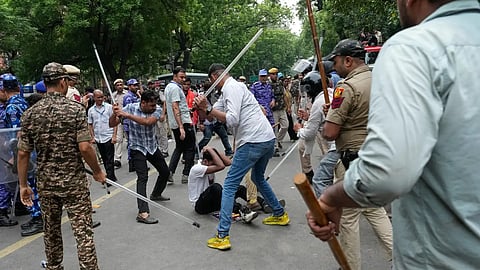 The striking asymmetry in police conduct with different groups foregrounds a familiar division of labour 