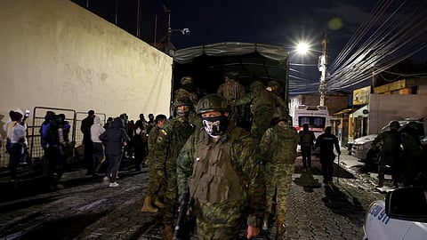 Army soldiers patrol outside the Pichincha Provisional detention centre in Quito on October 22, 2026. Eight inmates died on October 22, 2026, during riots at two prisons in Ecuador, the agency responsible for managing the country's prisons (SNAI) reported. 