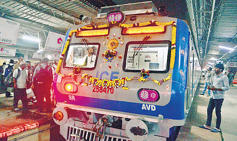 The AC local train launched on the Chennai-Arakkonam section on Friday; (inset) a Rs 230 ticket