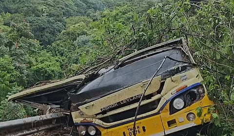 A video screen grab of a TNSTC bus trapped in a major landslide at Burliyar on the Mettupalayam–Coonoor ghat road