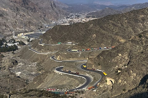 Trucks are parked along roadside near Torkham border crossing point, Pakistan, on Feb. 28, 2026.
