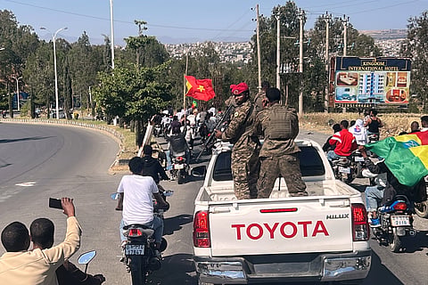 Soldiers participate in a procession welcoming former Tigray leader Getachew Reda in Mekelle, Ethiopia, Sunday, Oct. 11, 2026.