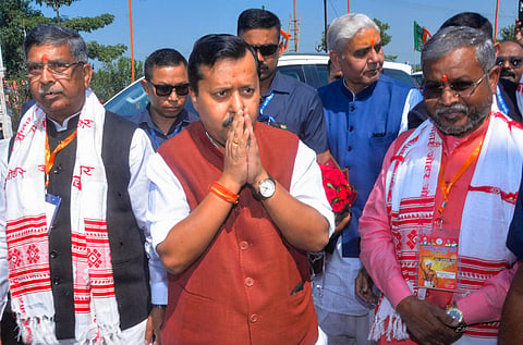BJP National President Nitin Nabin greets party workers alongside Jharkhand BJP State President Babulal Marandi, right, upon arriving for a core committee meeting with district heads and district in-charges, in Ranchi, Saturday, Oct. 24, 2026. 