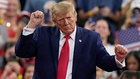 President Donald Trump dances as he departs after speaking during a campaign rally, Friday, Oct. 23, 2026, at Alico Arena on the campus of Florida Gulf Coast University in Fort Myers, Fla.