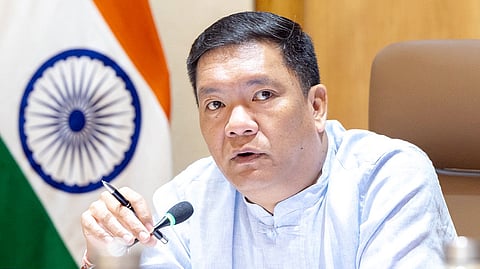 Arunachal Pradesh Chief Minister Pema Khandu speaks during a meeting in Itanagar.