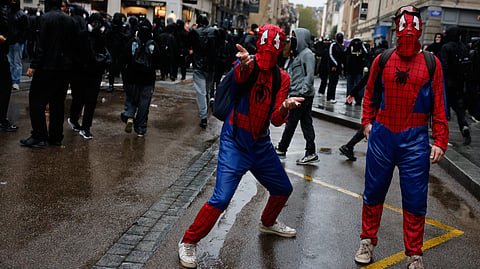 Protesters dressed as Spider-Man attend a demonstration against rising living costs in Rennes, France, Saturday, Oct. 24, 2026.