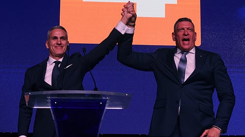 Independent presidential candidate Andrey Gyurov (L) and his vice-presidential running mate, Georgi Kandev, gesture during their campaign's closing event in Plovdiv, Bulgaria, on Oct. 21, 2026. 
