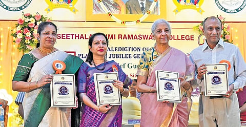 Union Minister Nirmala Sitharaman releases a souvenir during the platinum jubilee celebrations at Seetha Lakshmi Ramaswami College in Tiruchy on Monday  
