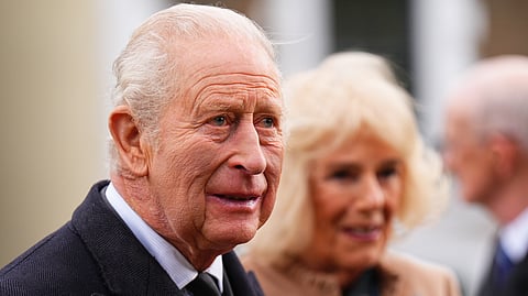 Britain's King Charles and Queen Camilla attend a commemoration event at Aberfan Memorial Garden, where survivors, bereaved families and community members pay tribute to the 144 people killed in the Aberfan disaster 60 years ago, in Aberfan, Wales, Wednesday, Oct. 21, 2026.