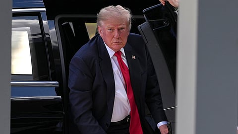 US President Donald Trump exits his vehicle as he arrives to cast his early-voting ballot for the 2026 midterm elections at the Palm Beach County Supervisor of Elections Office in West Palm Beach, Fla., Saturday, Oct. 24, 2026