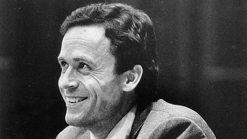 Serial killer Ted Bundy smiles during the second day of jury selection for his murder trial in a Dade County courtroom in Miami on June 27, 1979.