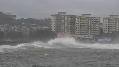 High tidal waves hit the coast under overcast skies in Visakhapatnam, Andhra Pradesh, Tuesday, Oct. 27, 2026. 