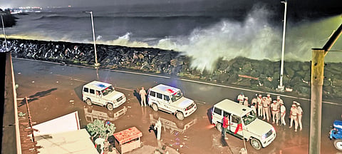Waves come crashing on the bund along the Ennore Expressway in North Chennai
