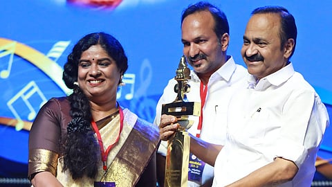 Writer R Rajasree receives the 50th Vayalar Award from Chief Minister V D Satheesan during the valedictory function of the Vayalar Year 2025-26, in the presence of Cultural Affairs Minister P C Vishnunadh.