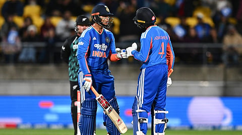 India's Vaibhav Sooryavanshi, left, and teammate Abhishek Sharma gesture during the third T20 cricket international match between New Zealand and India in Wellington, New Zealand, Tuesday, Oct. 27, 2026.