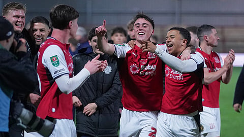 Fleetwood's players celebrate after winning a penalty shootout during the English League Cup soccer match between Fleetwood Town and Arsenal in Fleetwood, England, Tuesday, Oct. 27, 2026. 