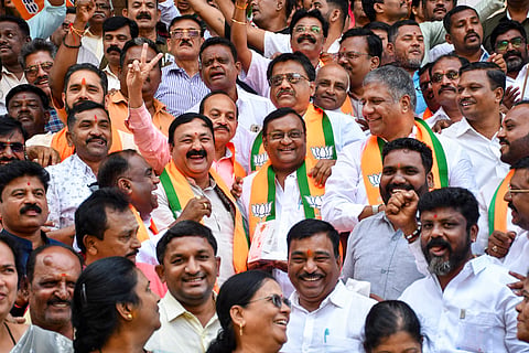 BJP leaders celebrate after winning four seats in the Karnataka Legislative Council (MLC) polls, in Hubballi, Wednesday, Oct. 28, 2026. 