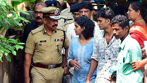 ADGP P Vijayan, the investigating officer, interacting with the relatives of Jayabalakrishnan outside the latter’s residence on Tuesday.