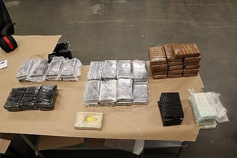 An Indian-origin truck driver hailing from Punjab has been charged in Canada for allegedly trying to smuggle 52 bricks of cocaine and heroin across the Canada-US border. 