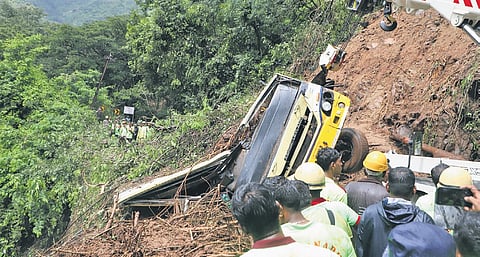 Rescue personnel at work after a landslide hit Burliyar on October 23