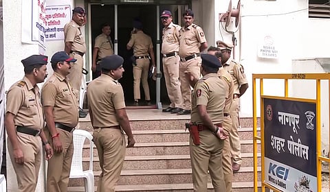  Security personnel present near the Mankapur Indoor Stadium counting centre on the second counting day for Nagpur Division Graduates’ Constituency MLC election, in Nagpur on Wednesday.