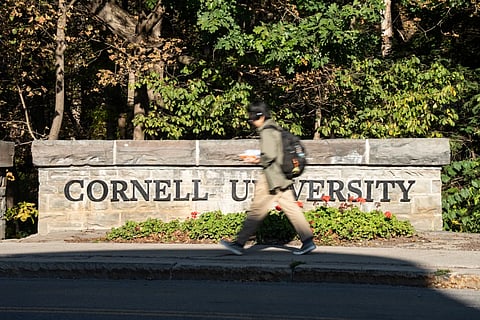 Students walk through Cornell University's campus, Wednesday, Oct. 7, 2026, in Ithaca, N.Y.