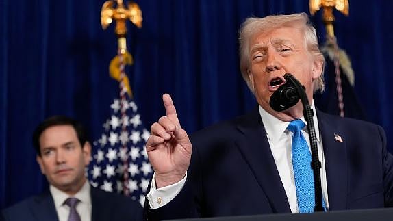 Following 200 per cent tariff threat on French wine, Trump shares ...