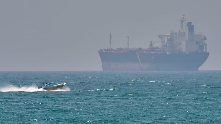 Iran fires on three ships in the Strait of Hormuz as US maintains ...