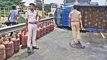 Mini-van loaded with cylinders overturns on highway, traffic hit in Odisha