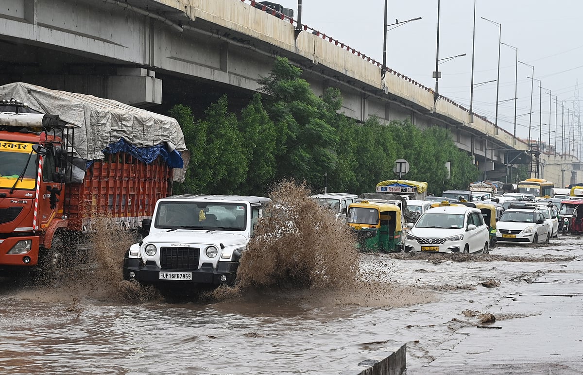 Heavy rain cripples Delhi, triggers widespread waterlogging; IMD issues red  alert