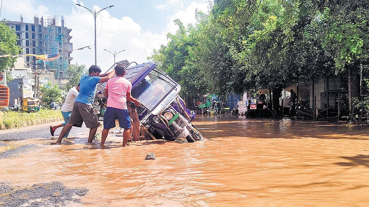 Gurugram's monsoon flooding exposes chronic urban planning failures as arterial roads submerge and sewage enters homes; MCG official Yash Jhulka cites 65 km of roads lacking drainage
