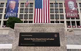 US unemployment claims dip to 206,000 as layoffs continue to remain rare