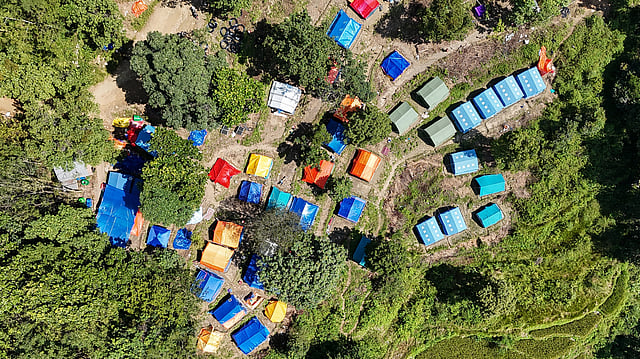 'Tough to stay here': Nepal flood survivors wait for homes
