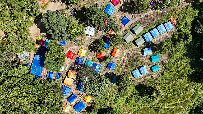 'Tough to stay here': Nepal flood survivors wait for homes