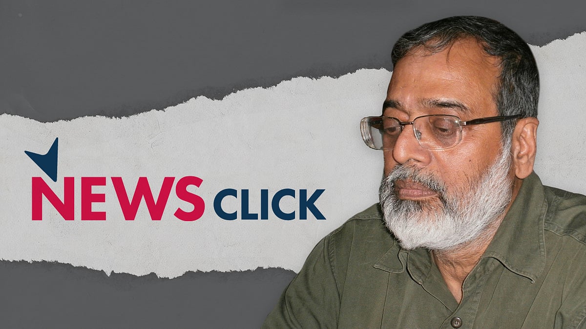 A cutout of Prabir Purkayastha with the NewsClick logo in the background.