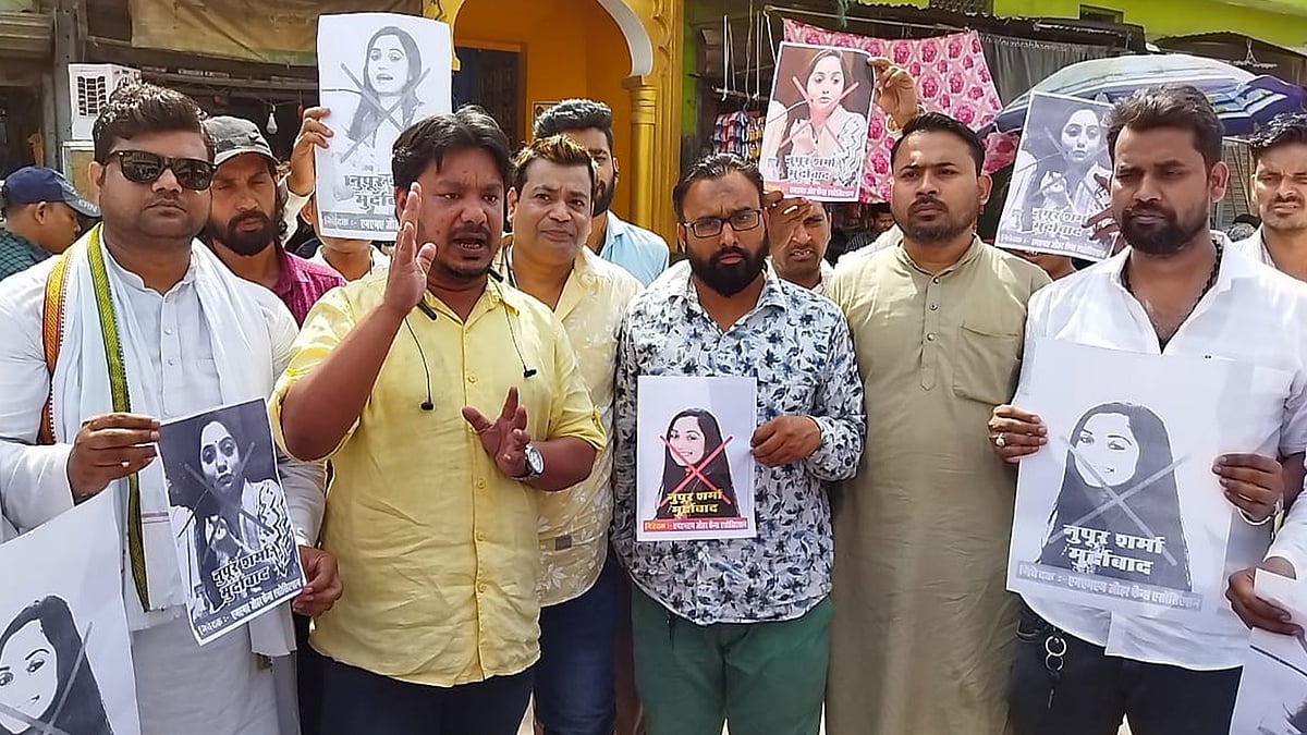 Hayat Zafar Hashmi, in pale shirt, is alleged to have masterminded the violence. 