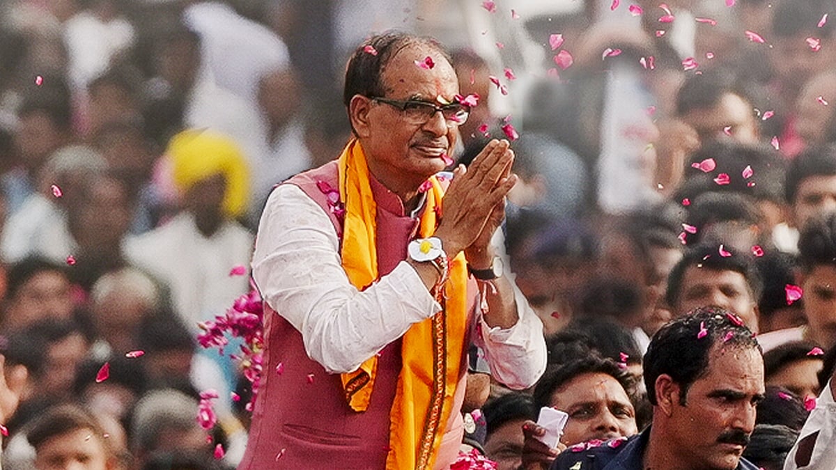 Chouhan greets participants with hands folded, at a rally in Madhya Pradesh.