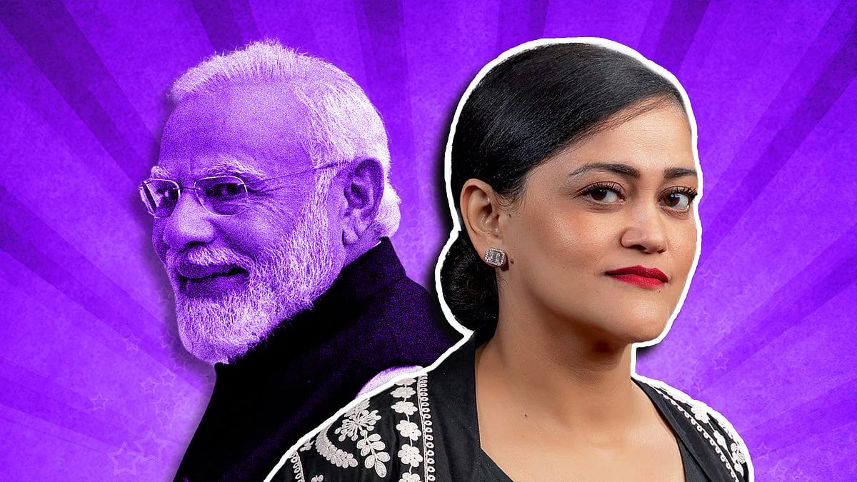 Kalli Purie with Narendra Modi in the background.