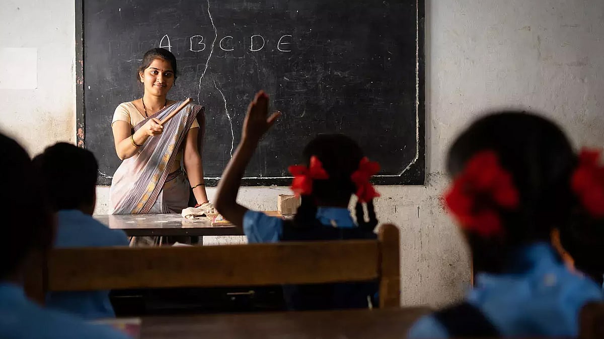 Representational image of a teacher in a classroom.