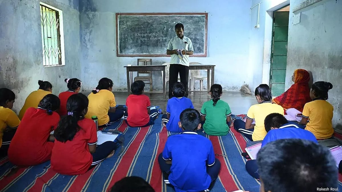 Children sitting in a classroom in Odisha.