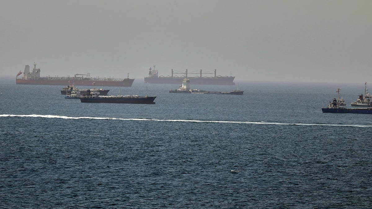 Tankers and cargo vessels in Gulf of Oman, along shipping routes linking Strait of Hormuz and Arabian Sea. 