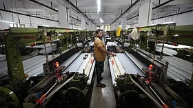 How one Indian textile worker copes with extreme heat in factory work and cramped living quarters