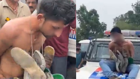 hands tied sandals garlanded half naked Young man accused of theft in Jammu paraded in public