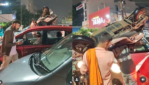 യാര് ഇവന്‍ യാര് ഇവന്‍....., ട്രാഫിക് ബ്ലോക്കില്‍ സ്‌കൂട്ടര്‍ തോളിലേറ്റി യുവാക്കള്‍; വൈറലായി വീഡിയോ