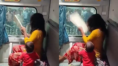 യുവതി വിൻഡോ തല്ലിപ്പൊളിക്കുന്നതിൻ്റെ ദൃശ്യം