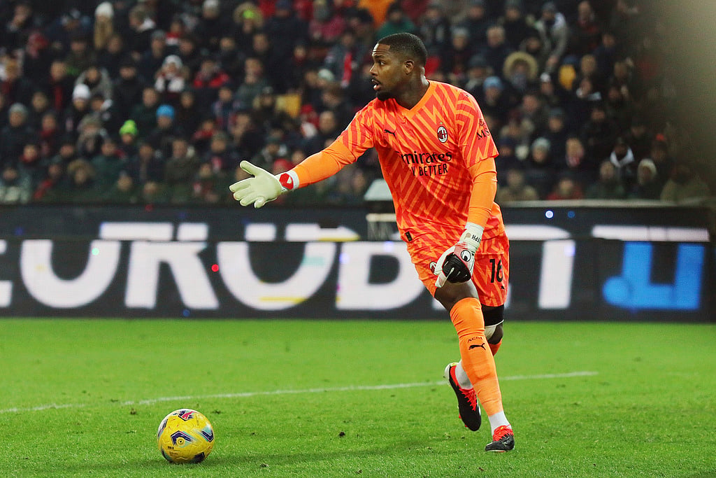 AP : AC Milan's goalkeeper Mike Maignan in action during the Italian Serie A football match between Udinese and AC Milan AP
