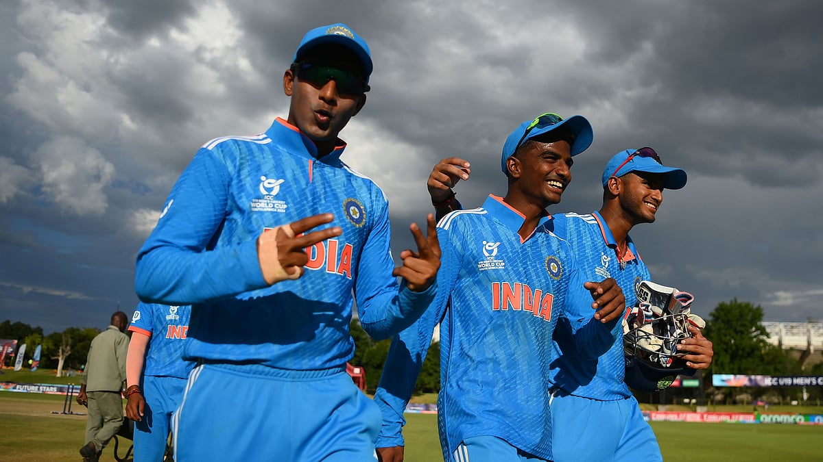 Courtesy: ICC : Indian players celebrate their win over the USA at Mangaung Oval on January 28, 2024, in Bloemfontein, South Africa.