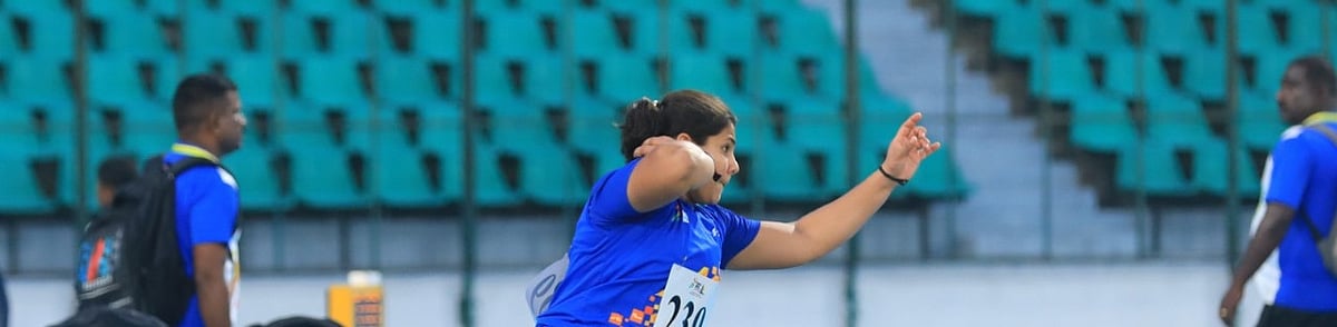 Photo: SAI : Anupriya VS of Kerala during the girls' shot put competition.
